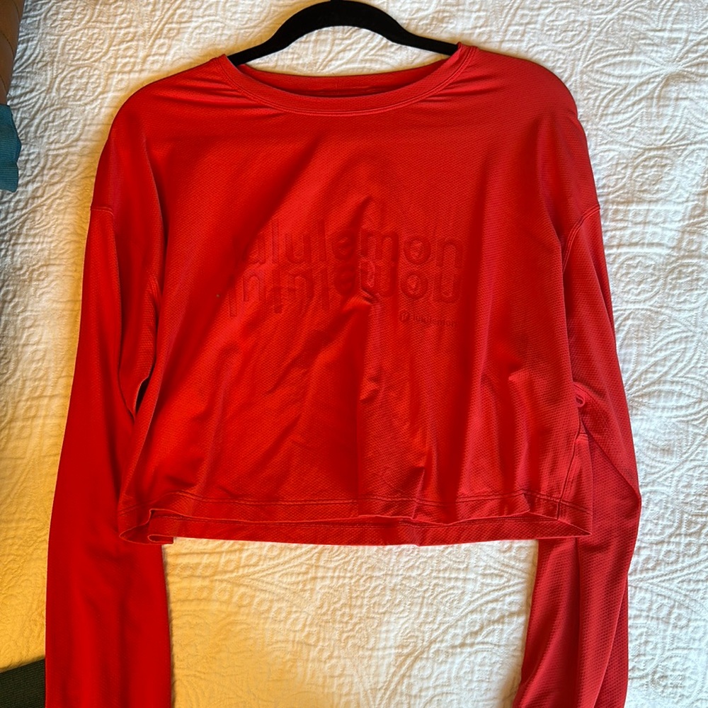 Bright orange cropped lululemon long sleeve